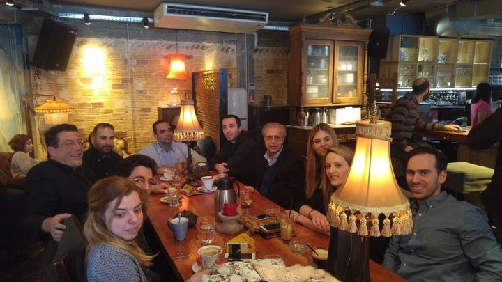 Members of the Association meeting around a table